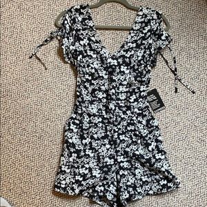 Express black/white floral romper size 0